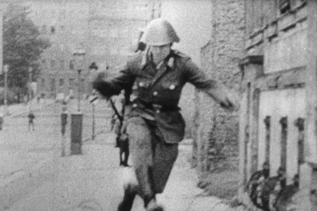 The image of East German border guard Conrad Schumann fleeing to West Germany made international front pages