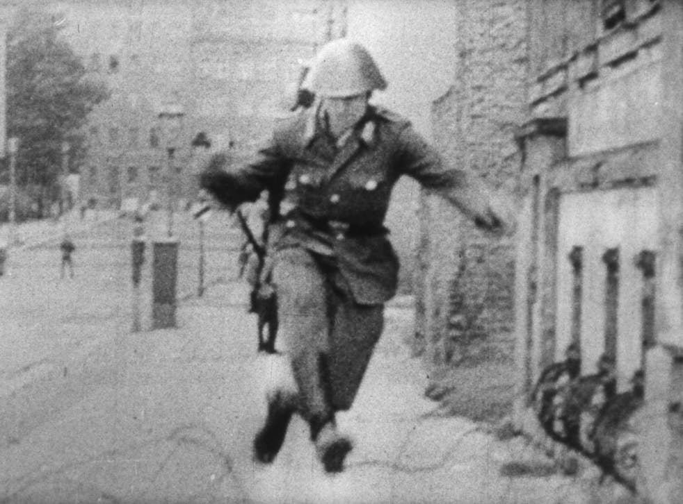The image of East German border guard Conrad Schumann fleeing to West Germany made international front pages