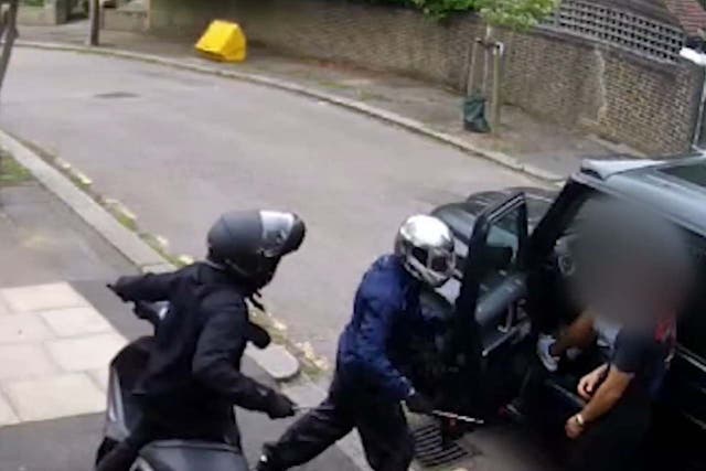 CCTV footage of Ashley Smith and Jordan Northover trying to rob Premier League stars Sead Kolasinac and Mesut Ozil of their watches in  in Platts Lane in Hampstead, north-west London