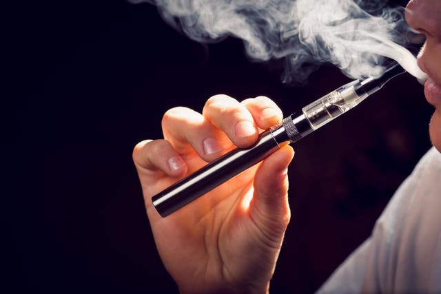 Amid growing bans around world, UK body still recommends vaping as safer alternative to smoking