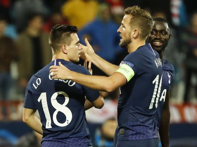 Giovani Lo Celso is embraced by Harry Kane after scoring for Spurs