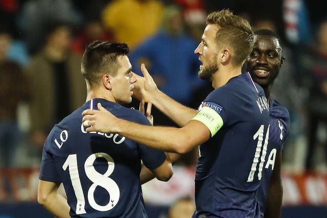 Giovani Lo Celso is embraced by Harry Kane after scoring for Spurs