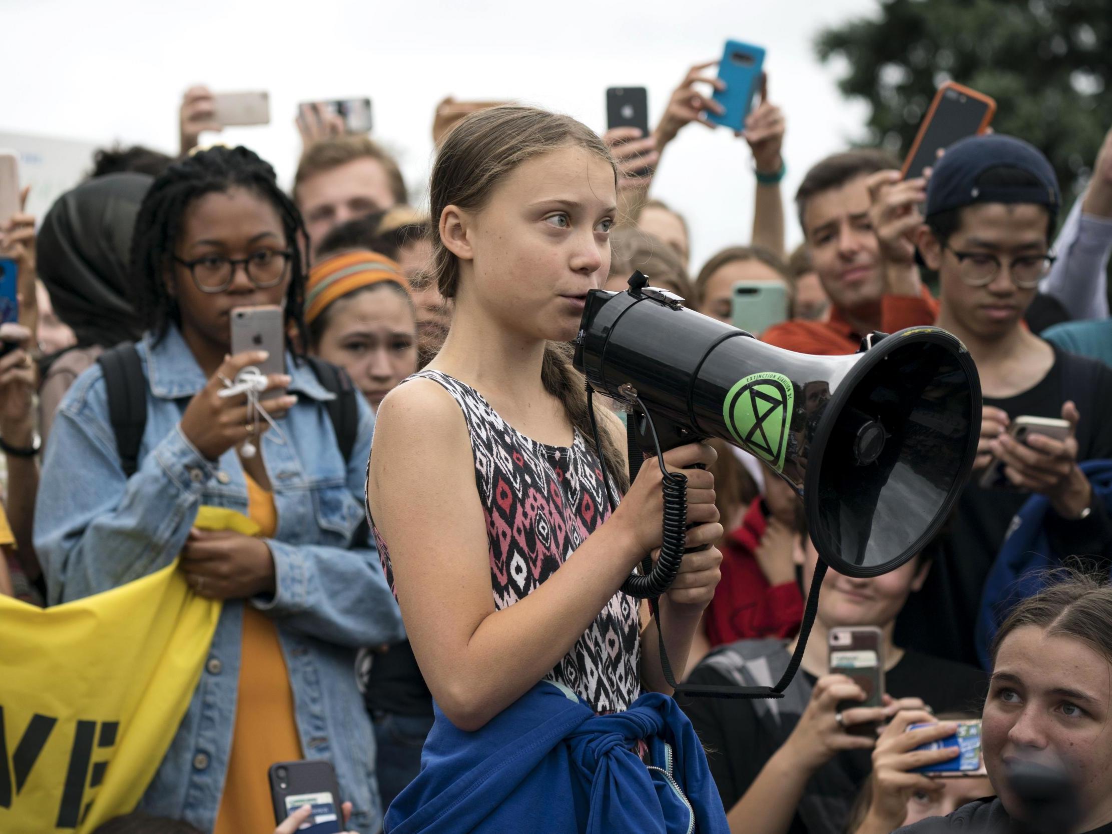Teenage Swedish climate activist Greta Thunberg addresses climate protesters outside the White House in September