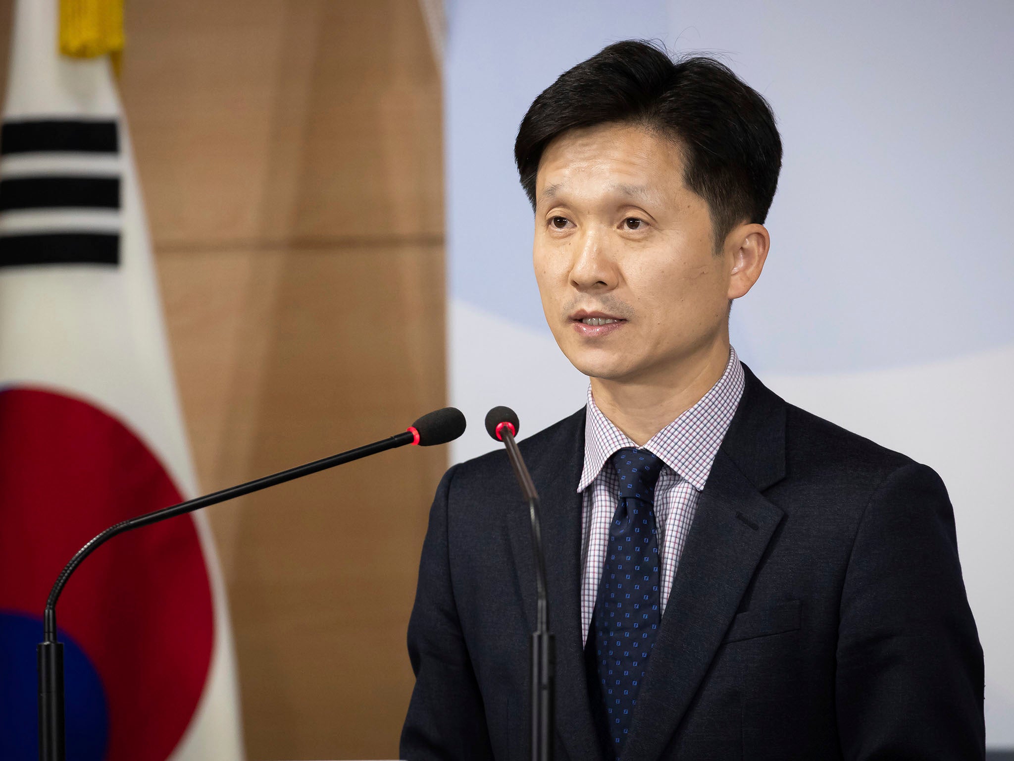 Mr Sang-min addresses the media government complex