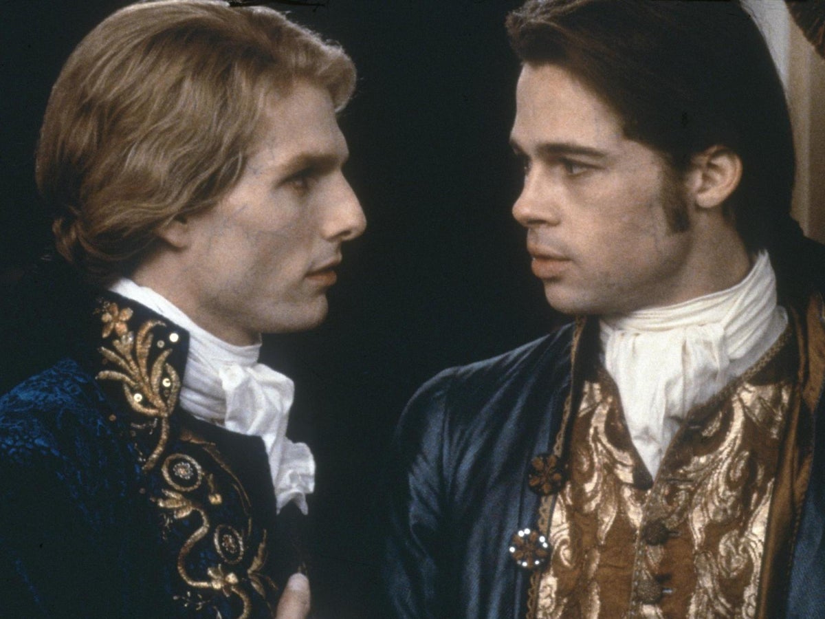 Tom Cruise and Brad Pitt looking at each other in Interview with the Vampire (1994)