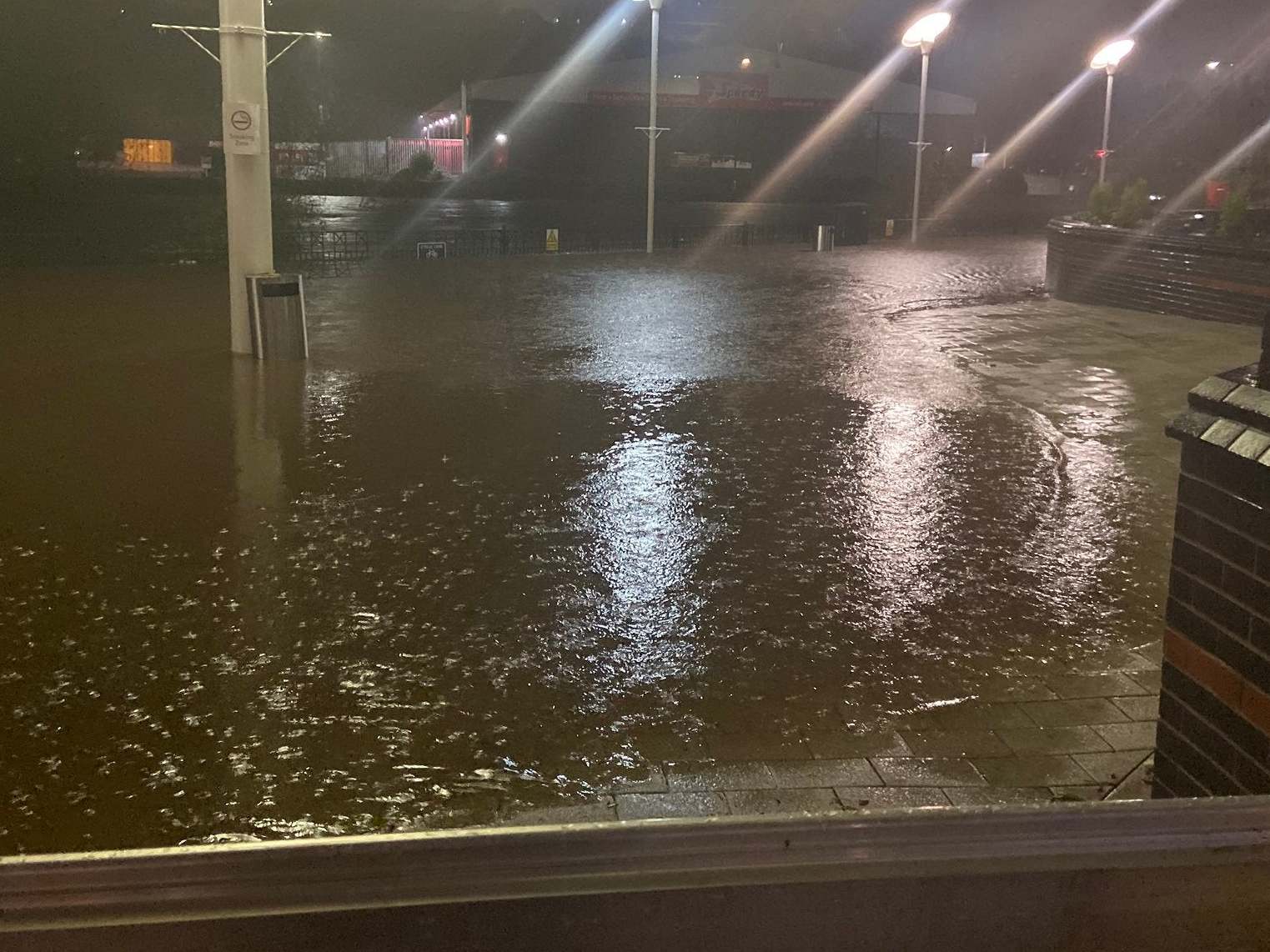 Photo of flood water outside Meadowhall shopping centre