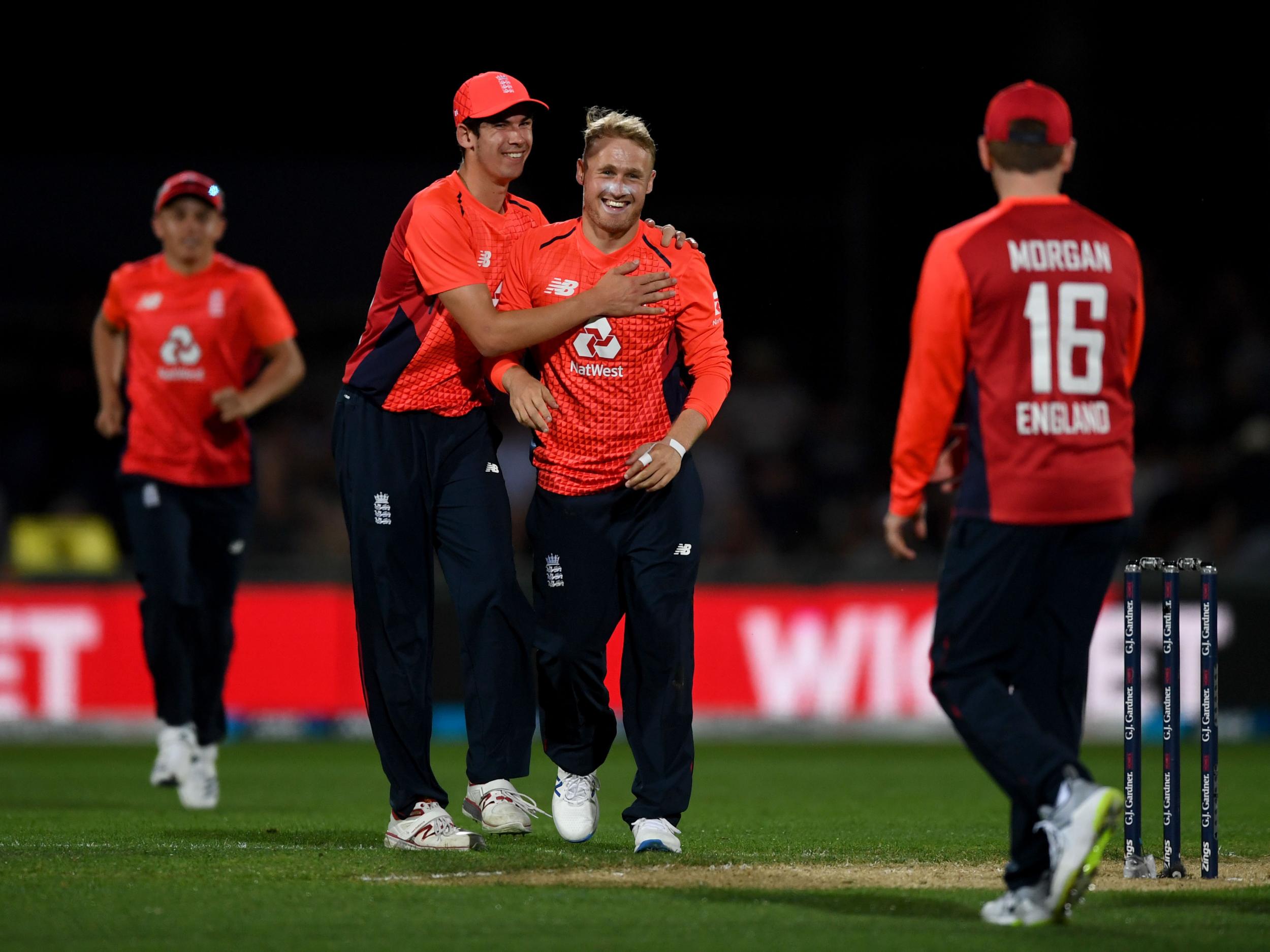 Matt Parkinson (centre) took four wickets as England secured a comfortable win