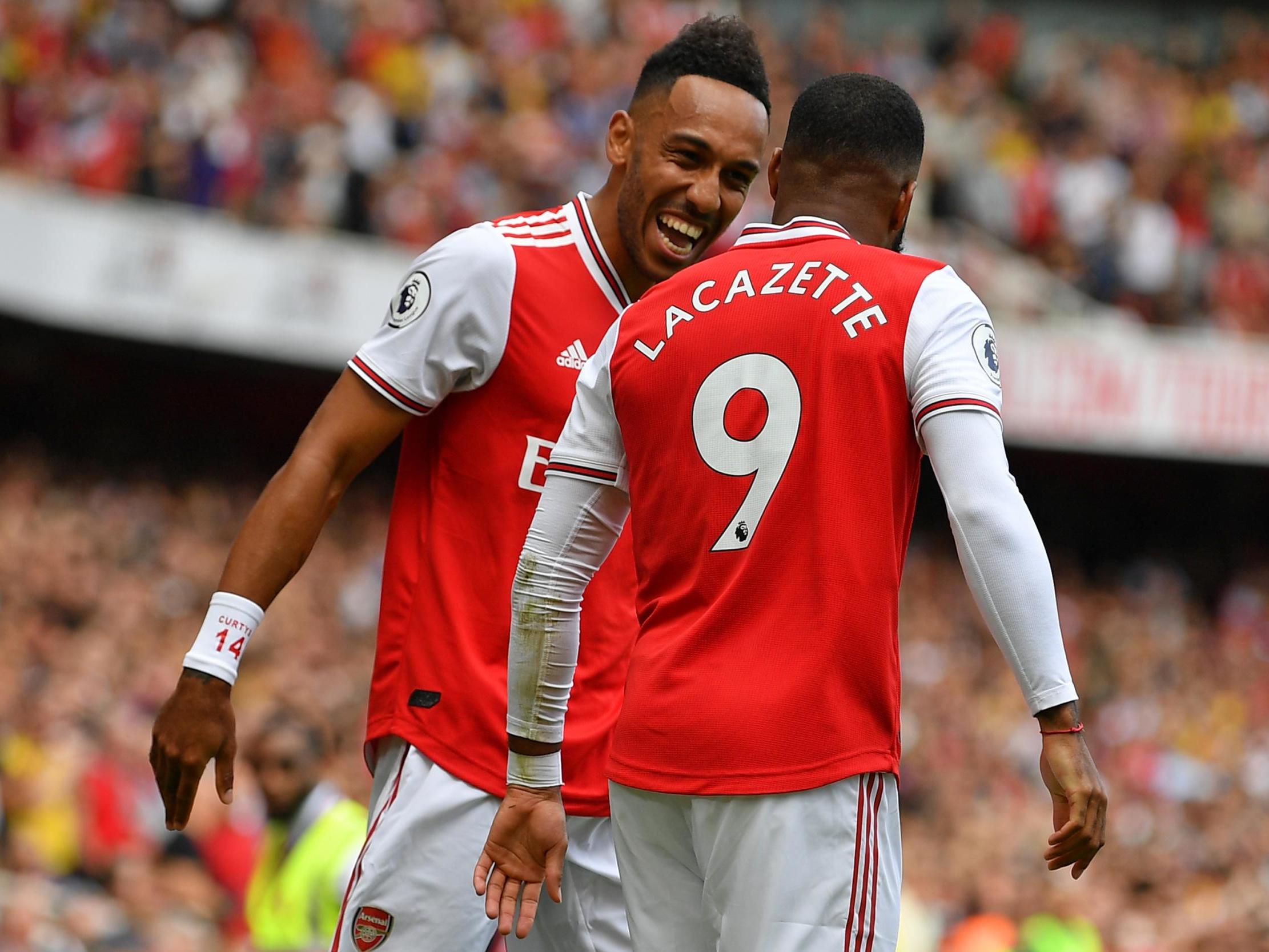 Aubameyang celebrates with strike partner Lacazette