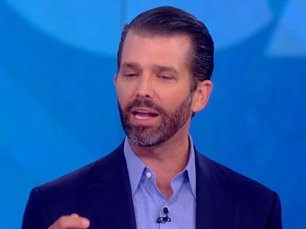Trump Jr booed by crowd during live TV clash
