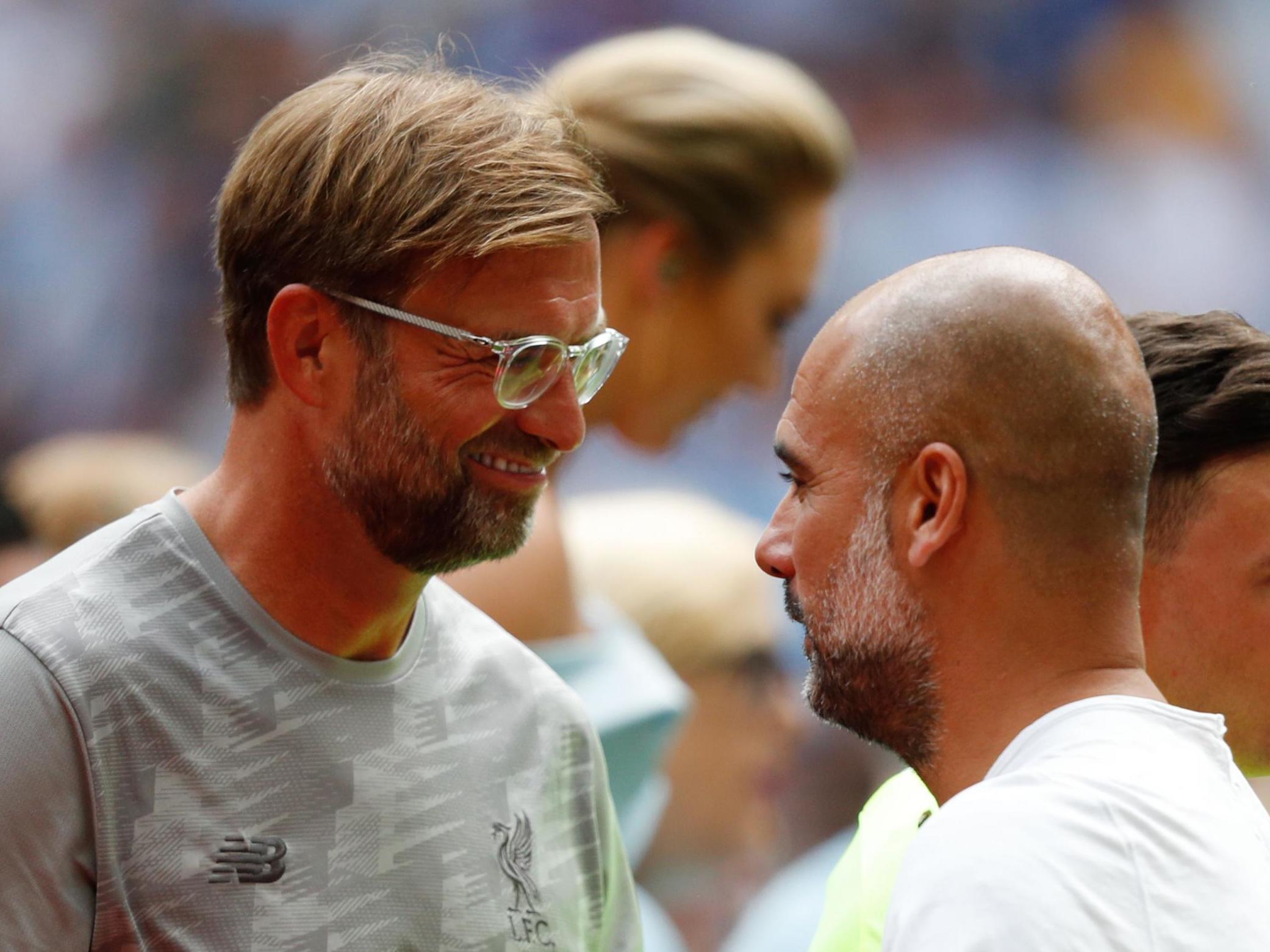 Liverpool manager Jurgen Klopp with Manchester City manager Pep Guardiola