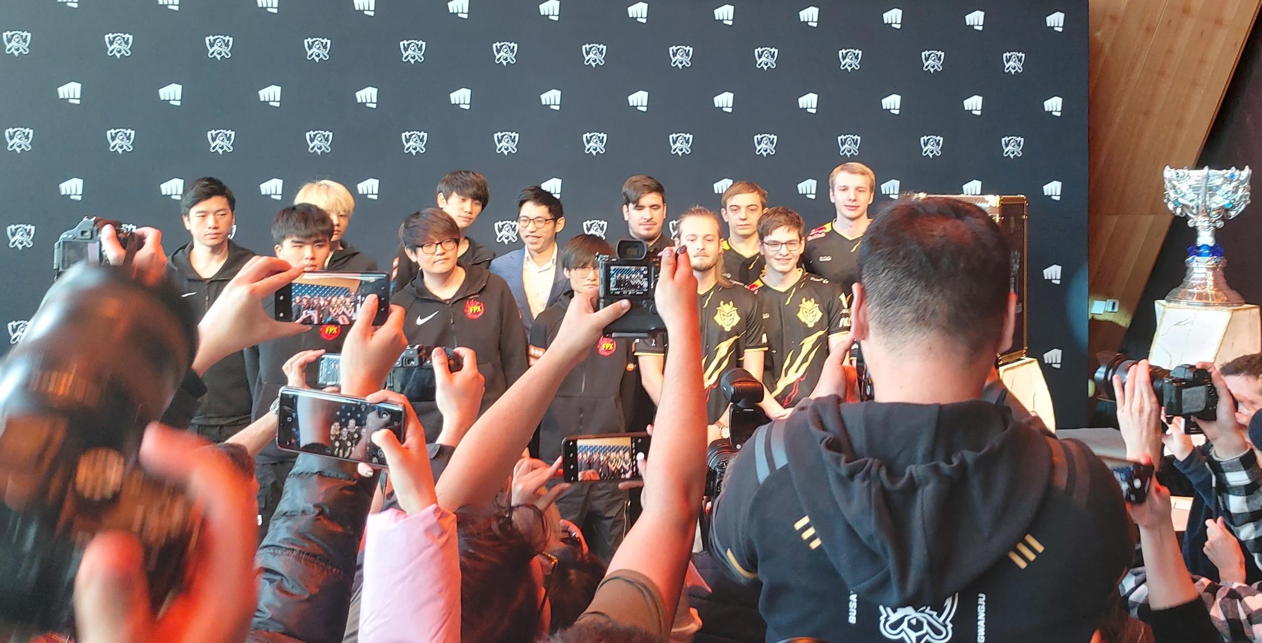 G2 and FPX pose for photos ahead of the 2019 League of Legends World Championship finals in Paris