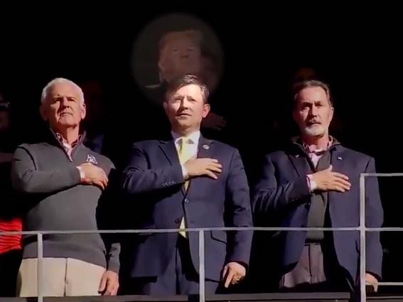 A screenshot of Donald Trump appearing to forget the words to the US national anthem