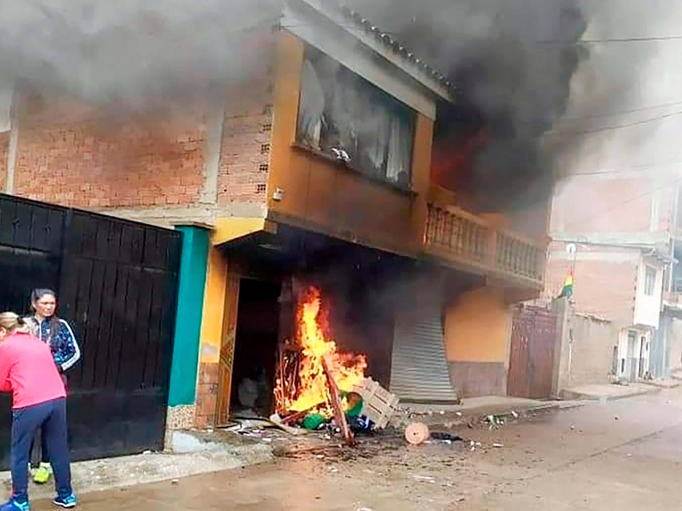 Image released by Boliva’s Presidency showing the house of Bolivia’s Ministry of Mining and Metallurgy, Cesar Navarro, burning after protesters set it on fire demanding his resignation on 10 November, 2019.