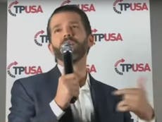 Trump Jr booed off stage by fans of his father amid ‘far-right split’