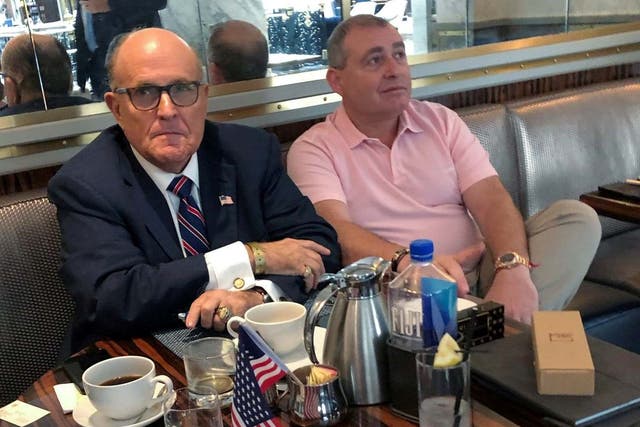 Lev Parnas (R) claims he pressured Ukraine to investigate the Bidens on Rudy Giuliani's (L) orders