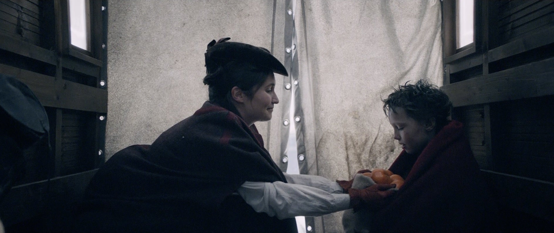 Mary Ann Sainsbury’s brings Nicholas back to town, gifting him with a bag of clementines (Sainsbury’s)