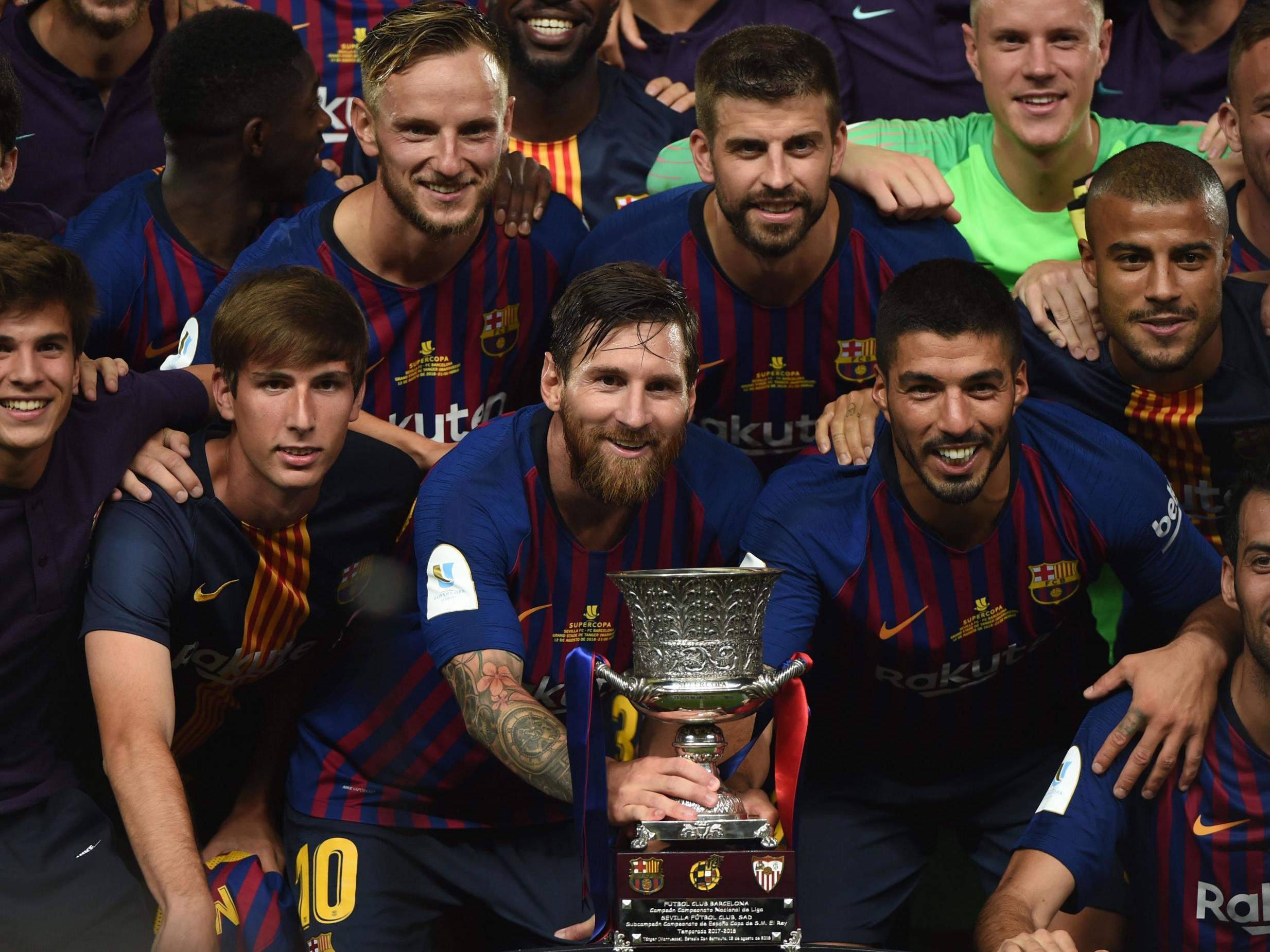 Lionel Messi and his Barcelona teammates with the Spanish Super Cup
