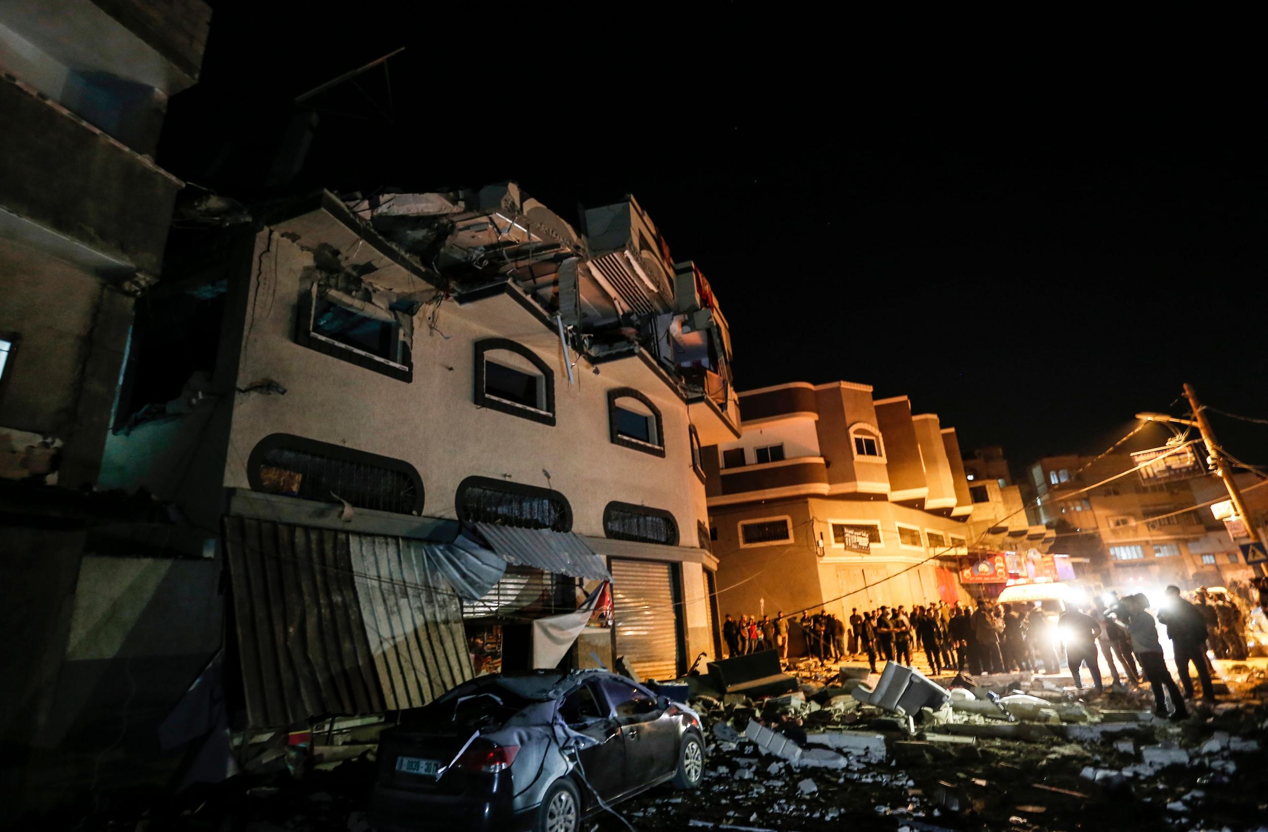 Palestinians inspect the damaged house of Islamic Jihad leader Baha Abu al-Ata afther an Israeli attack in Gaza city (AFP/Getty)