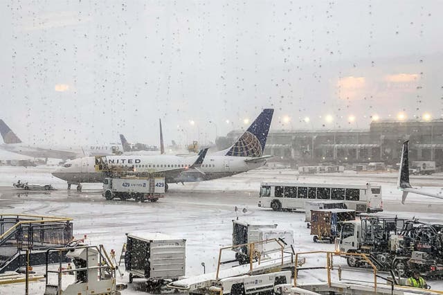 Snow falls at O'Hare Airport in Chicago