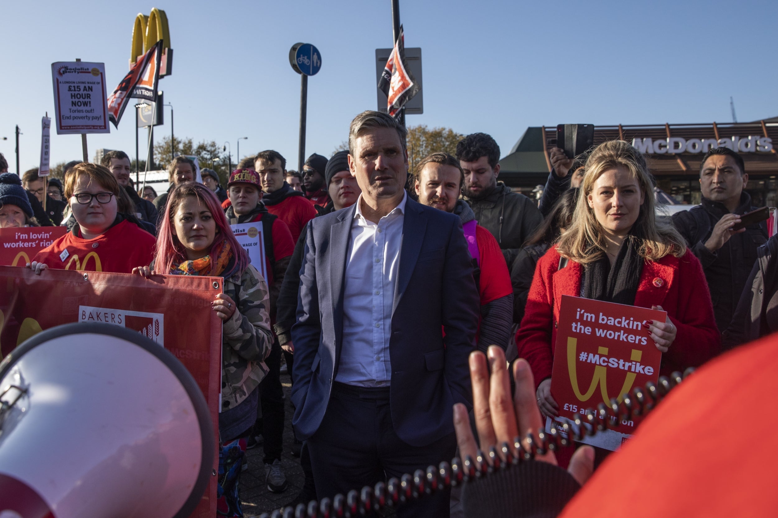Shadow brexit secretary, Sir Keir Starmer, joins union members and several McDonalds workers as they protest outside a drive through restaurant