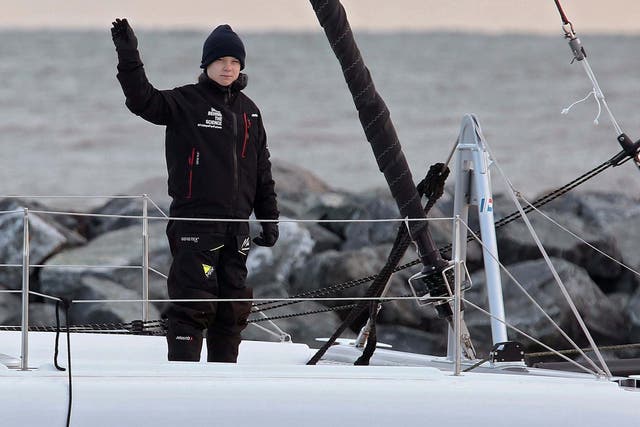 Thunberg waves from the 48-foot catamaran La Vagabonde on Wednesday