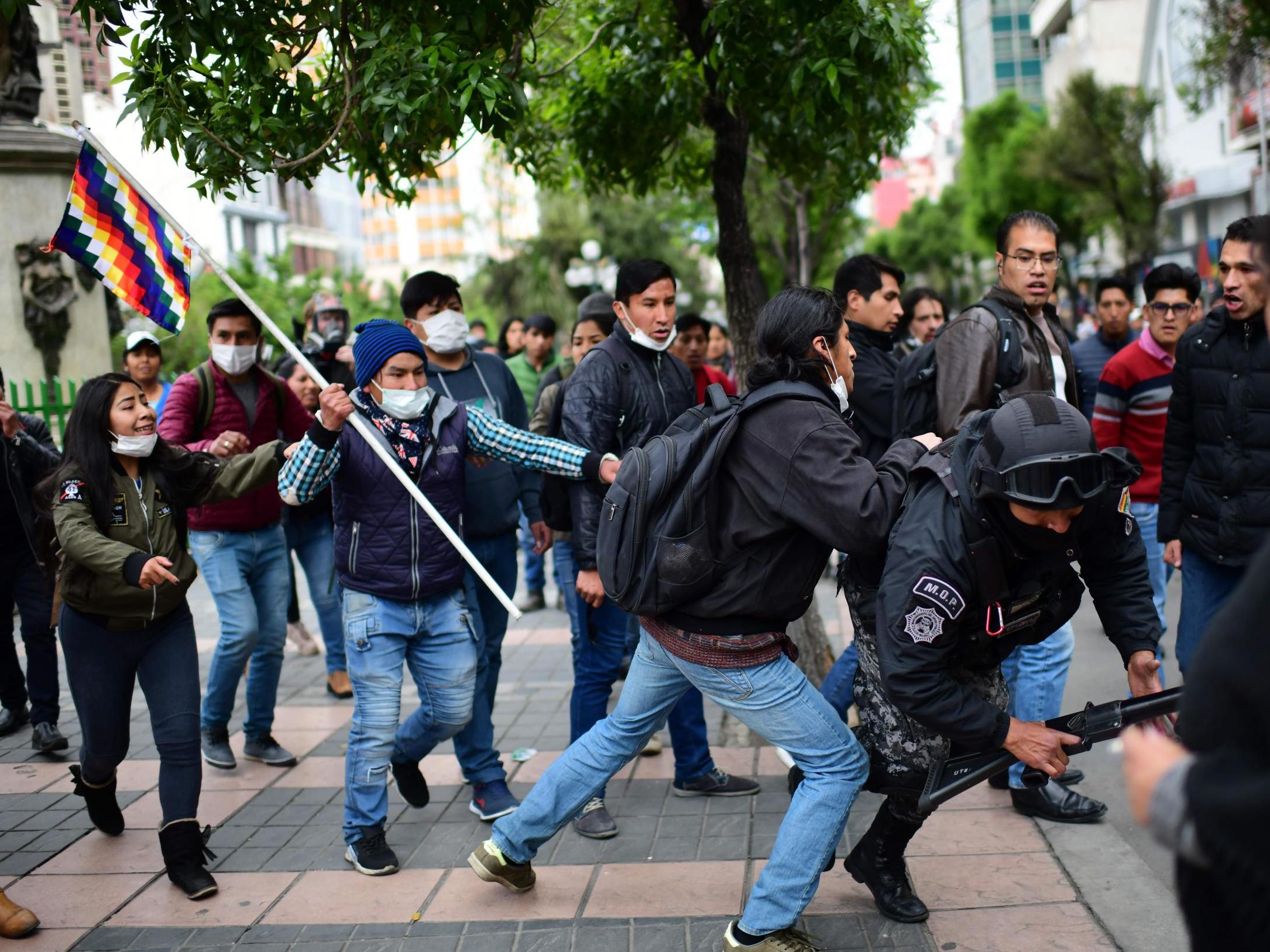 Protestors clash with security forces in La Paz, Bolivia's administrative capital
