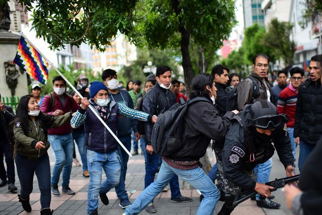 Protestors clash with security forces in La Paz, Bolivia's administrative capital