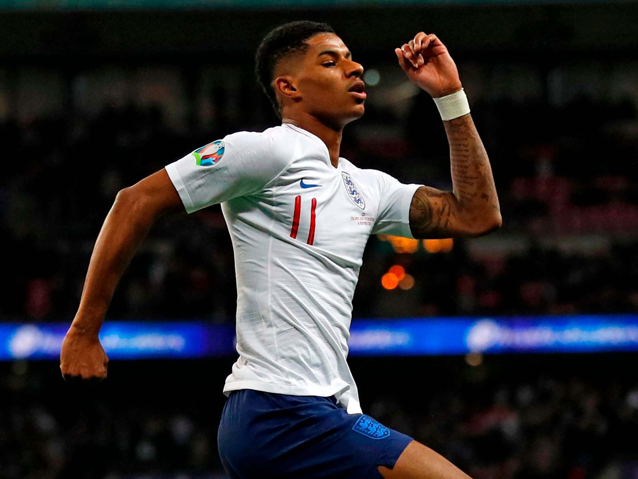 Rashford celebrates his goal for England