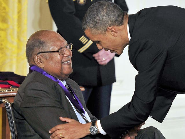 Gaines receives a National Arts and Humanities Medal from former president Barack Obama in 2013