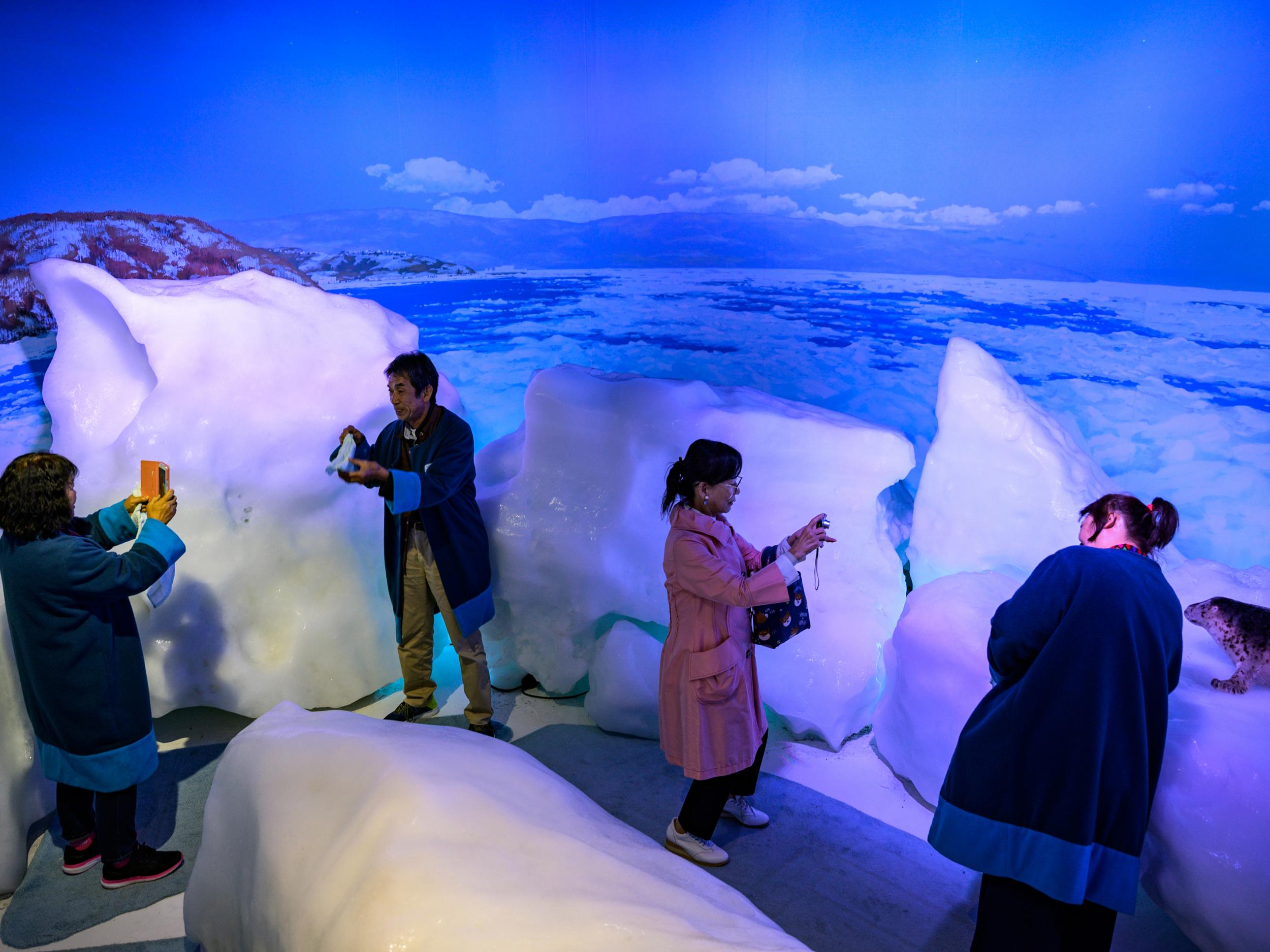 Tourist make their way through an ice exhibit at the Okhotsk Ryuhyo Museum