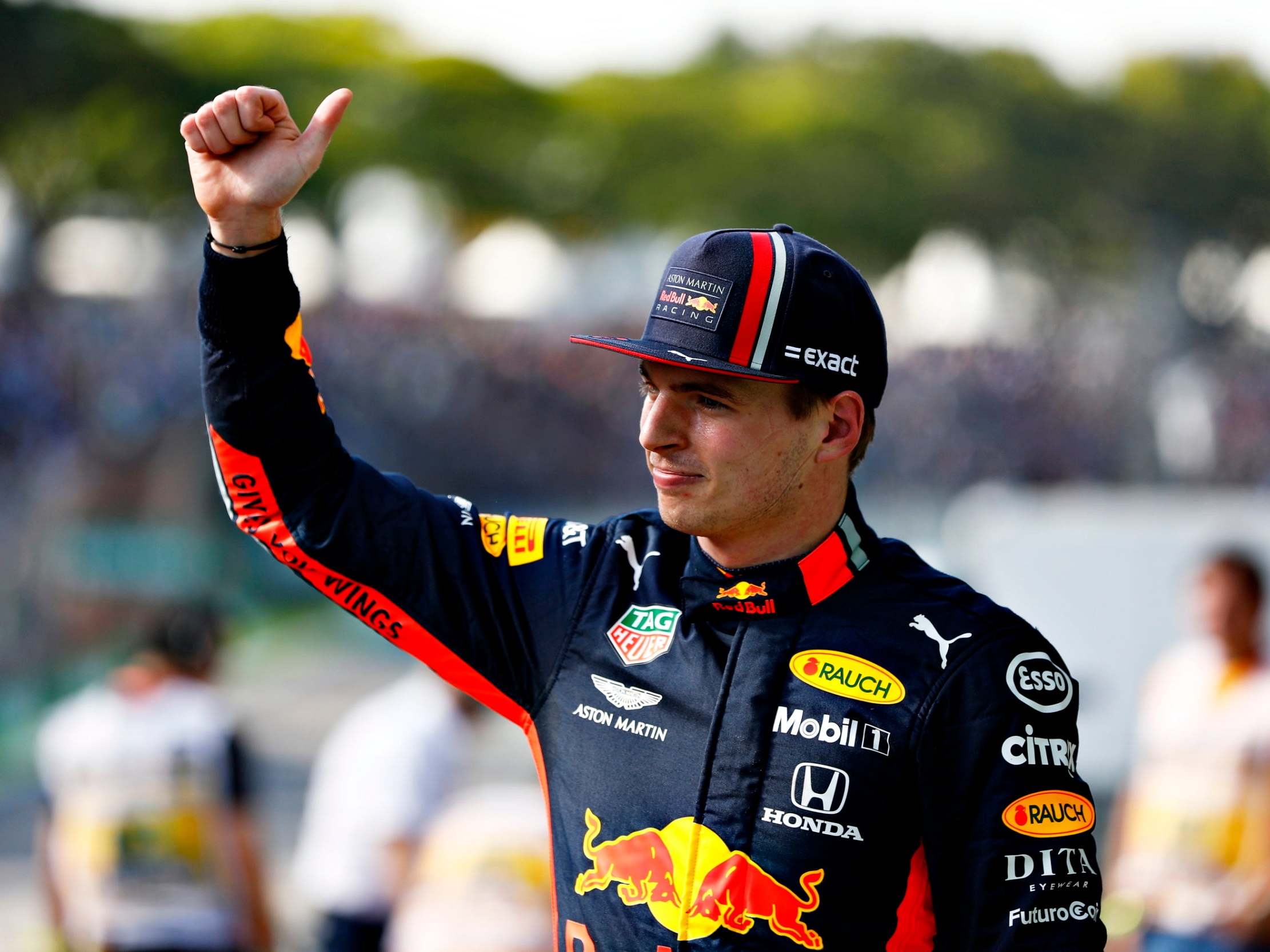 Max Verstappen celebrates winning pole at Interlagos