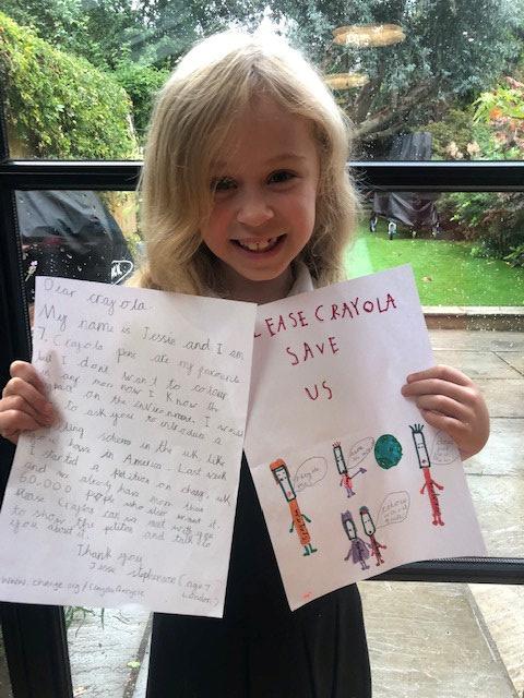 Jessie Stephenson with her letter and drawing to Crayola UK (SWNS)