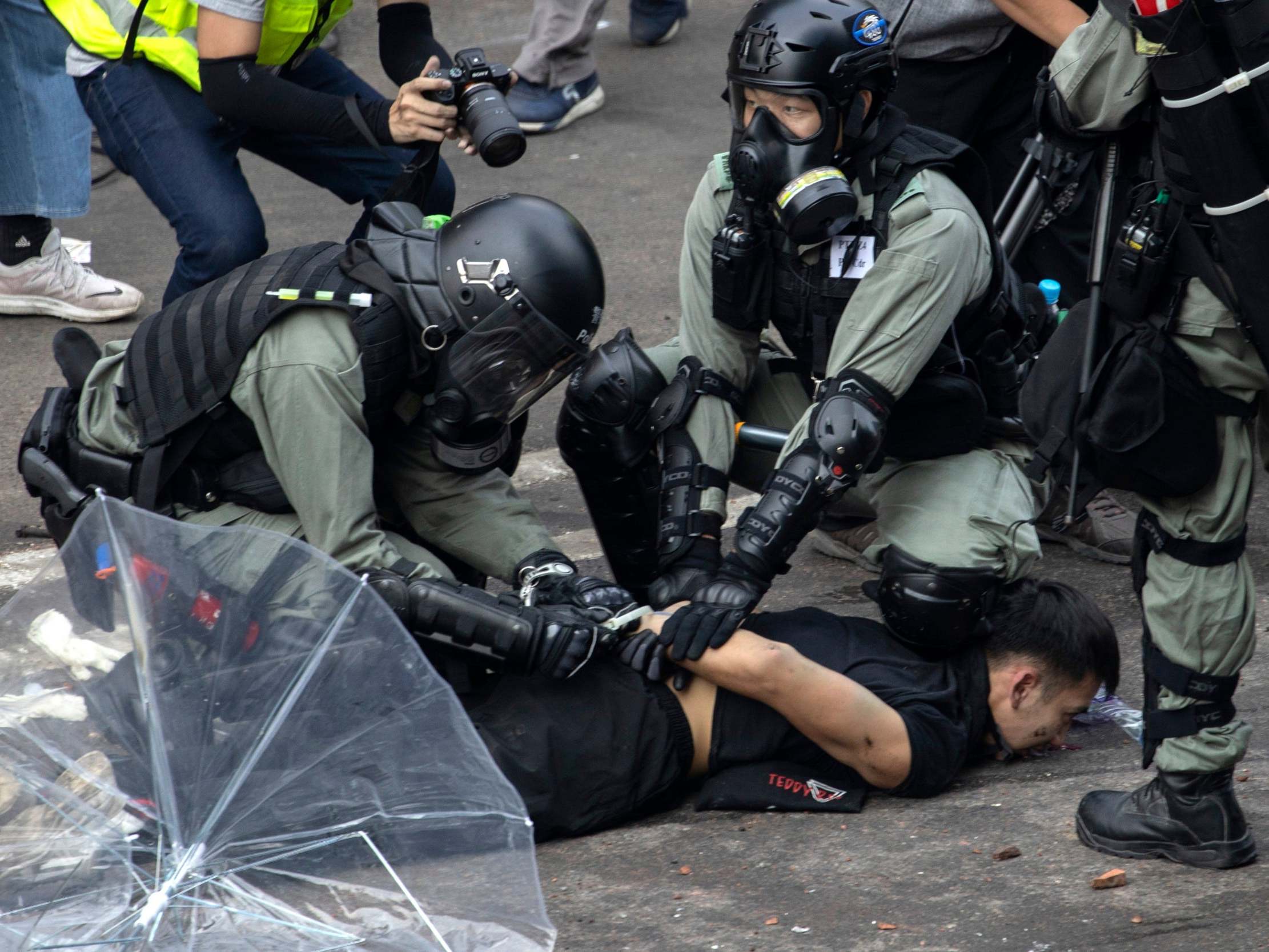 Police detain a protester at the Hong Kong Polytechnic University in November last year