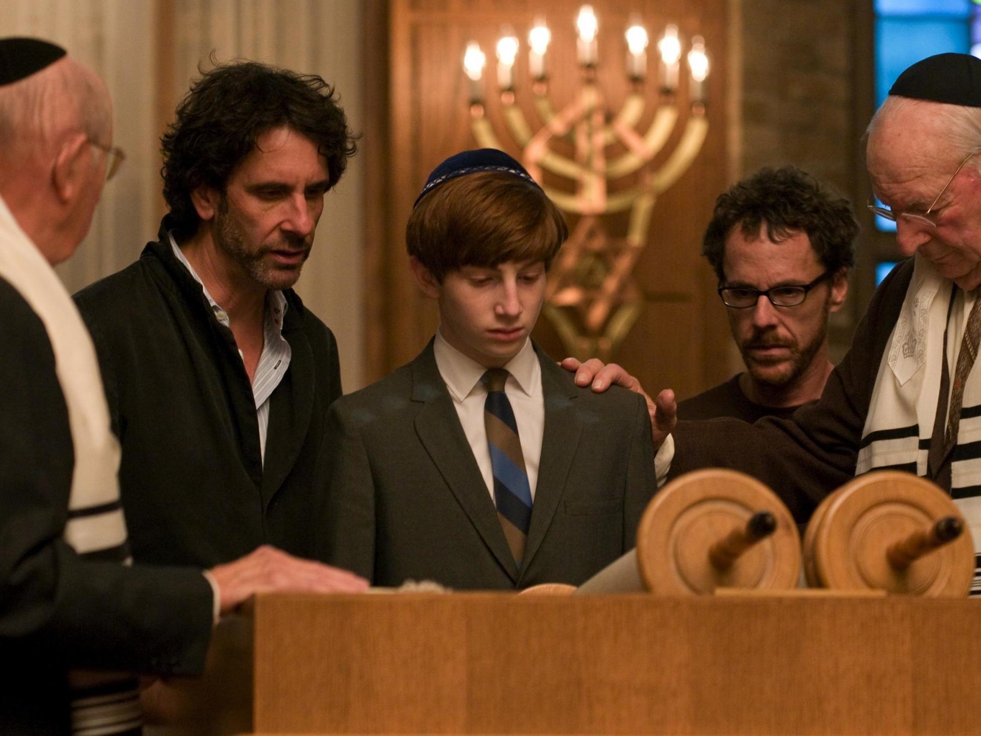 The backdrop to their upbringing: Joel and Ethan Coen direct Aaron Wolff (Danny) on set