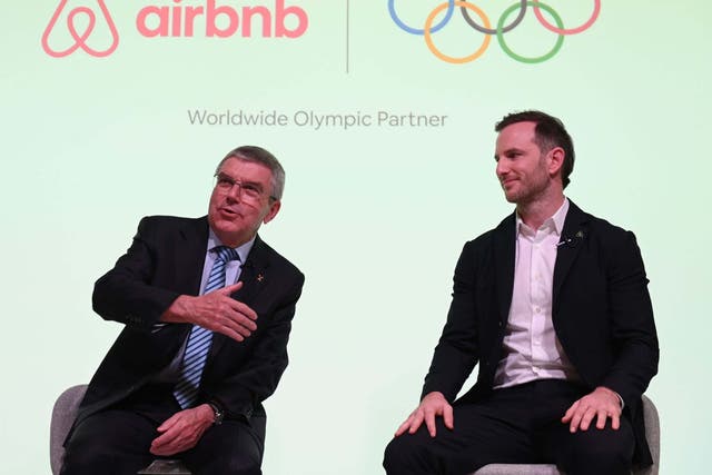 IOC president Thomas Bach alongside Airbnb co-founder Joe Gebbia