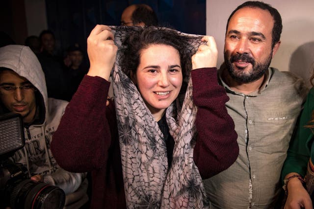Moroccan journalist Hajar Raissouni (left) leaves prison following her royal pardon in October