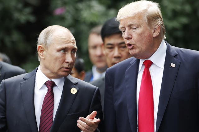 Donald Trump towers over Russian president Vladimir Putin