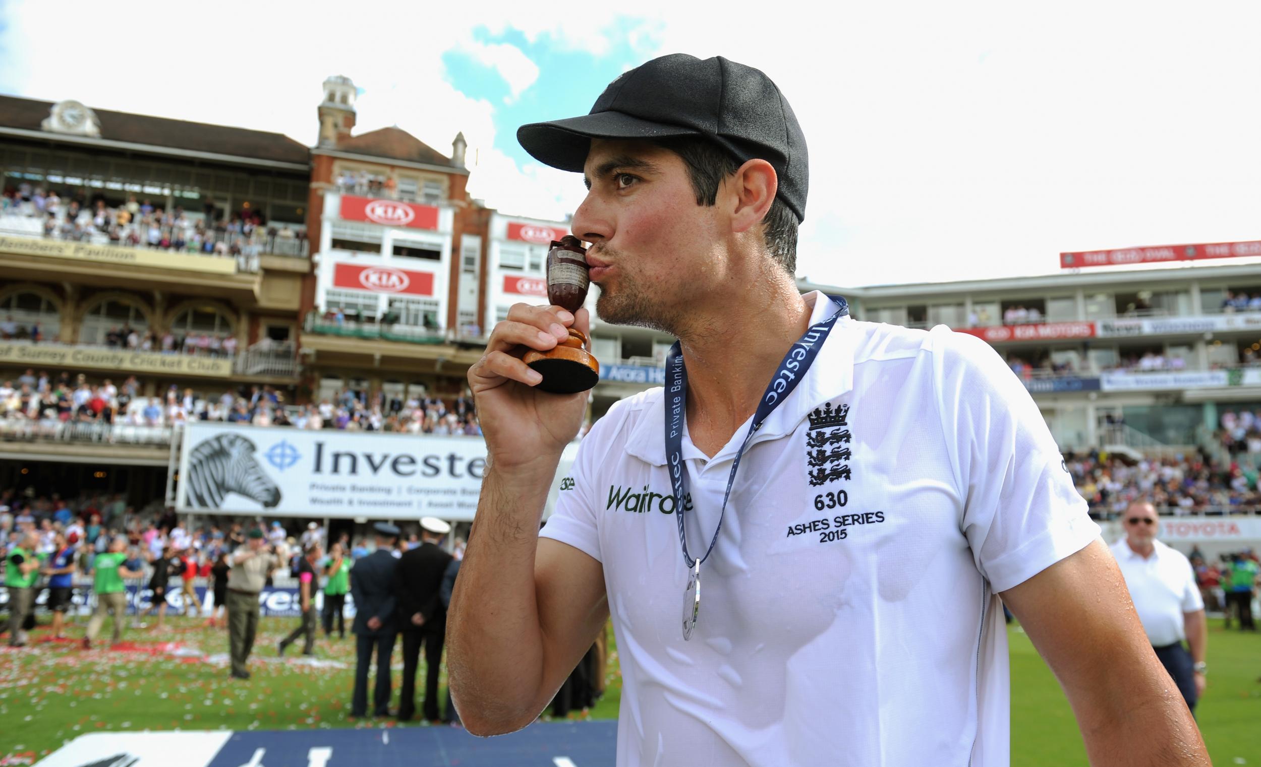 Cook celebrates with the Ashes urn at the Oval in August, 2015