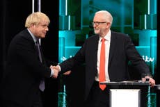 Boris Johnson and Corbyn share awkward handshake during debate