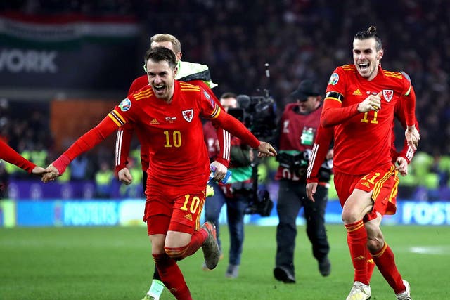 Aaron Ramsey and Gareth Bale celebrate after the full-time whistle