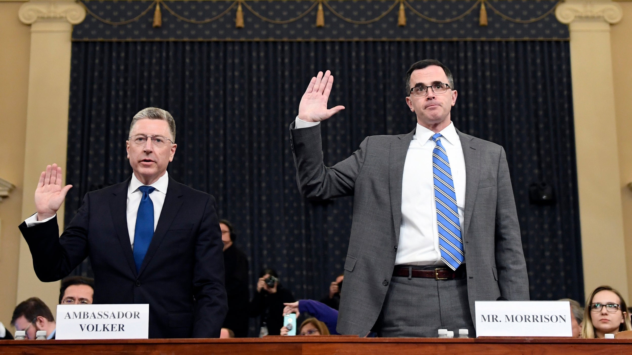 Trump news &ndash; live: Witnesses describe 'improper' Ukraine call as president mocks veteran's military uniform