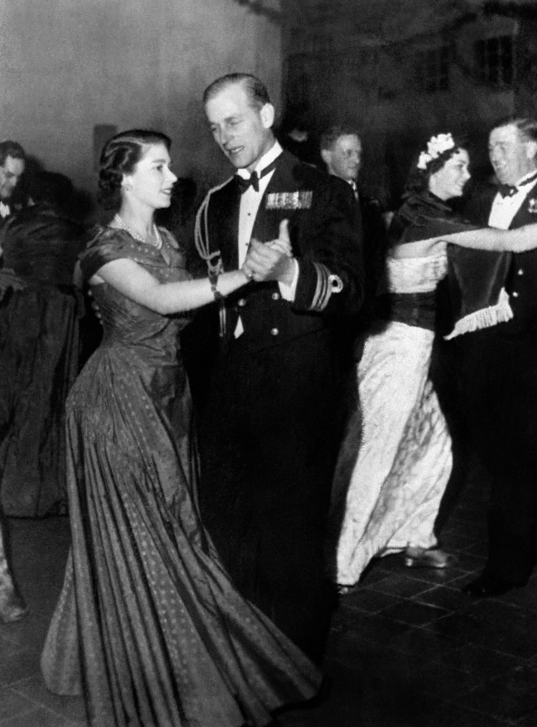 The couple dance the samba during a ball organised by the Royal Navy (18 December 195)