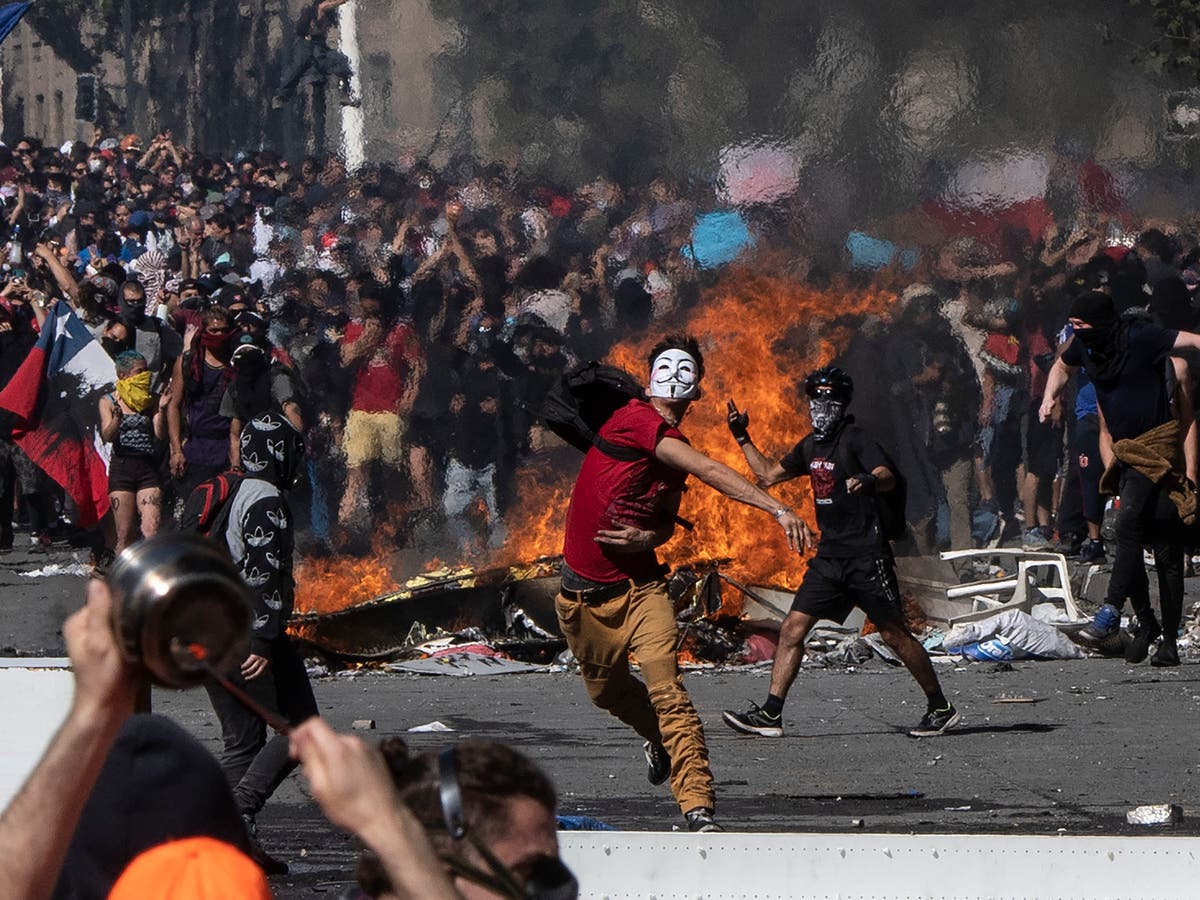 Hundreds of Chile protesters suffer ‘severe eye trauma’ from rubber bullets fired by police