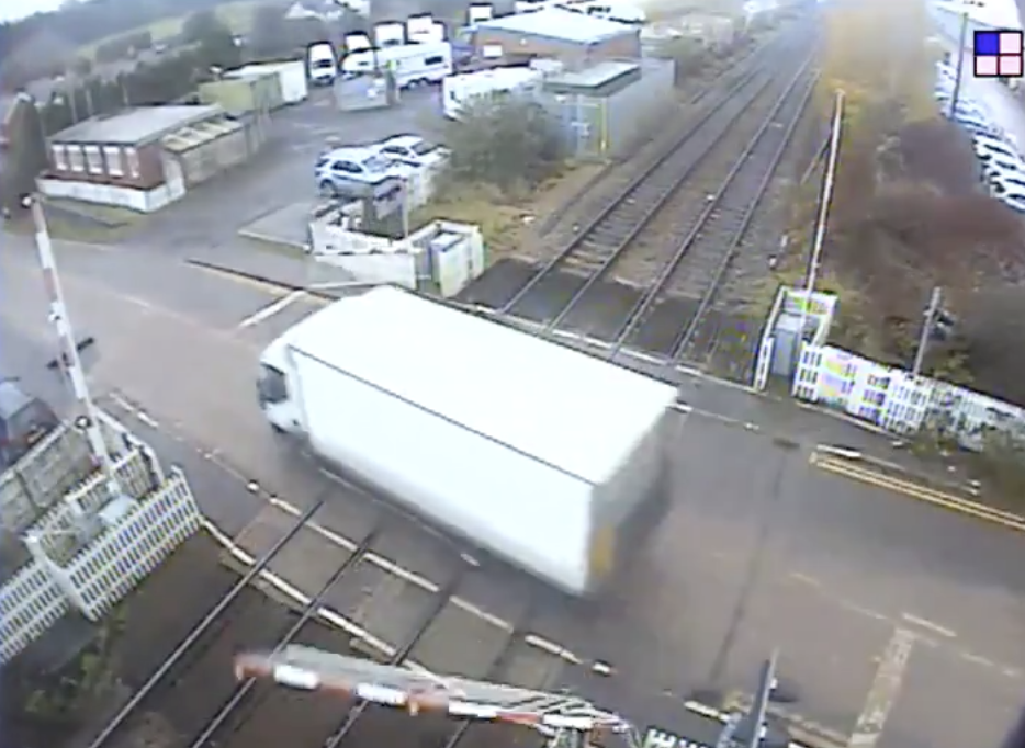 Truck smashes through level crossing barrier, causing rail delays in Midlands
