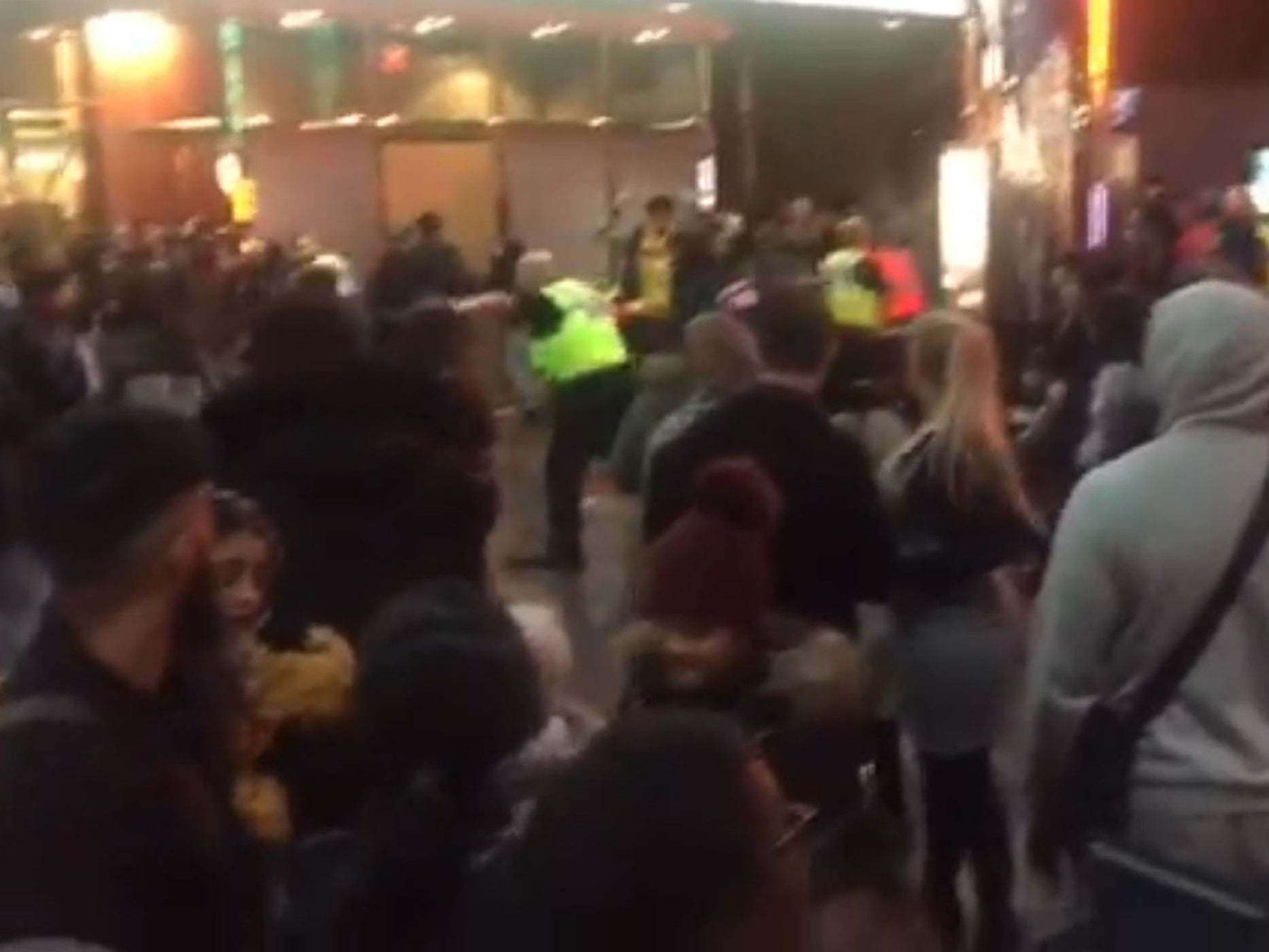 Police officers inside the Star City cinema in Birmingham after a large brawl broke out on 23 November