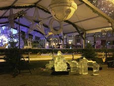 Child crushed to death by falling ice sculpture at Christmas market