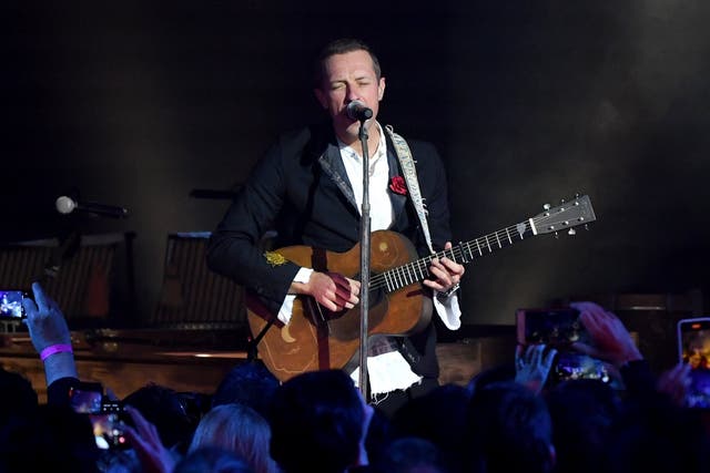 Chris Martin from Coldplay performs at the Natural History Museum