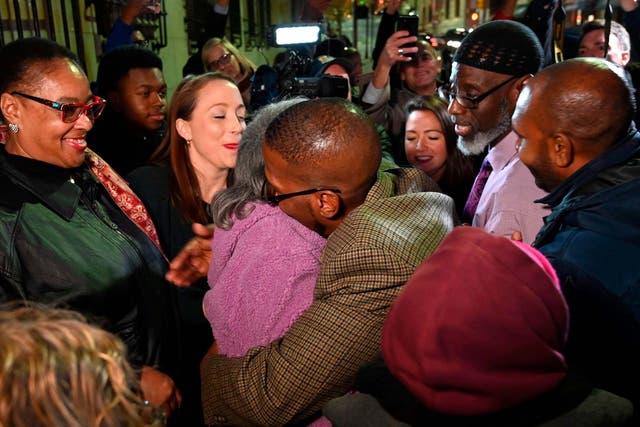 Alfred Chestnut hugs his mother Sarah after his release from prison in Baltimore, Maryland, US, on 25 November 2019 after serving 36 years for a murder he did not commit.