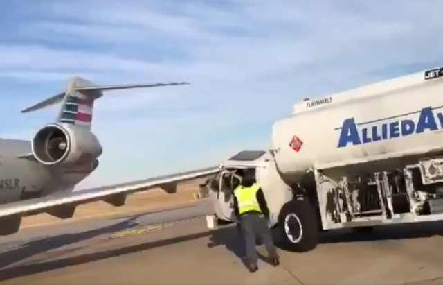 The fuel truck drove into the plane wing