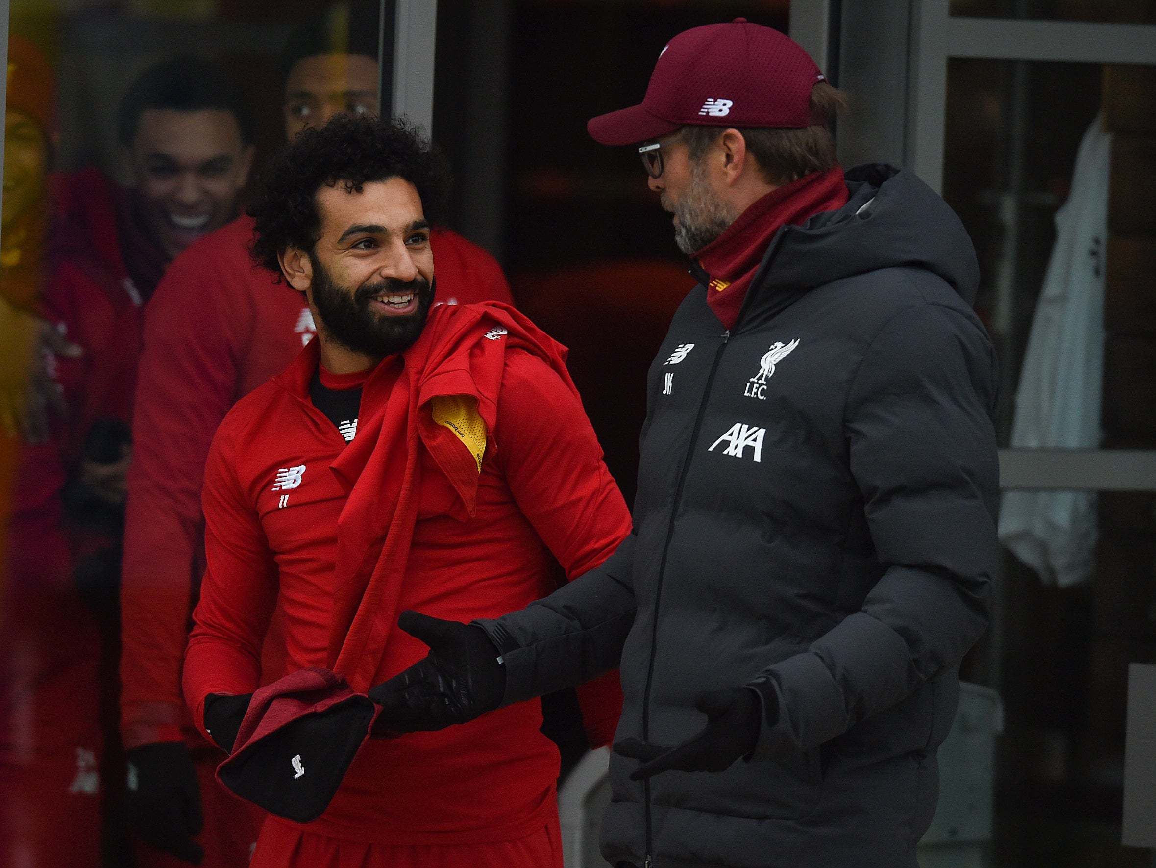 Jurgen Klopp with Mohamed Salah of Liverpool during a training session